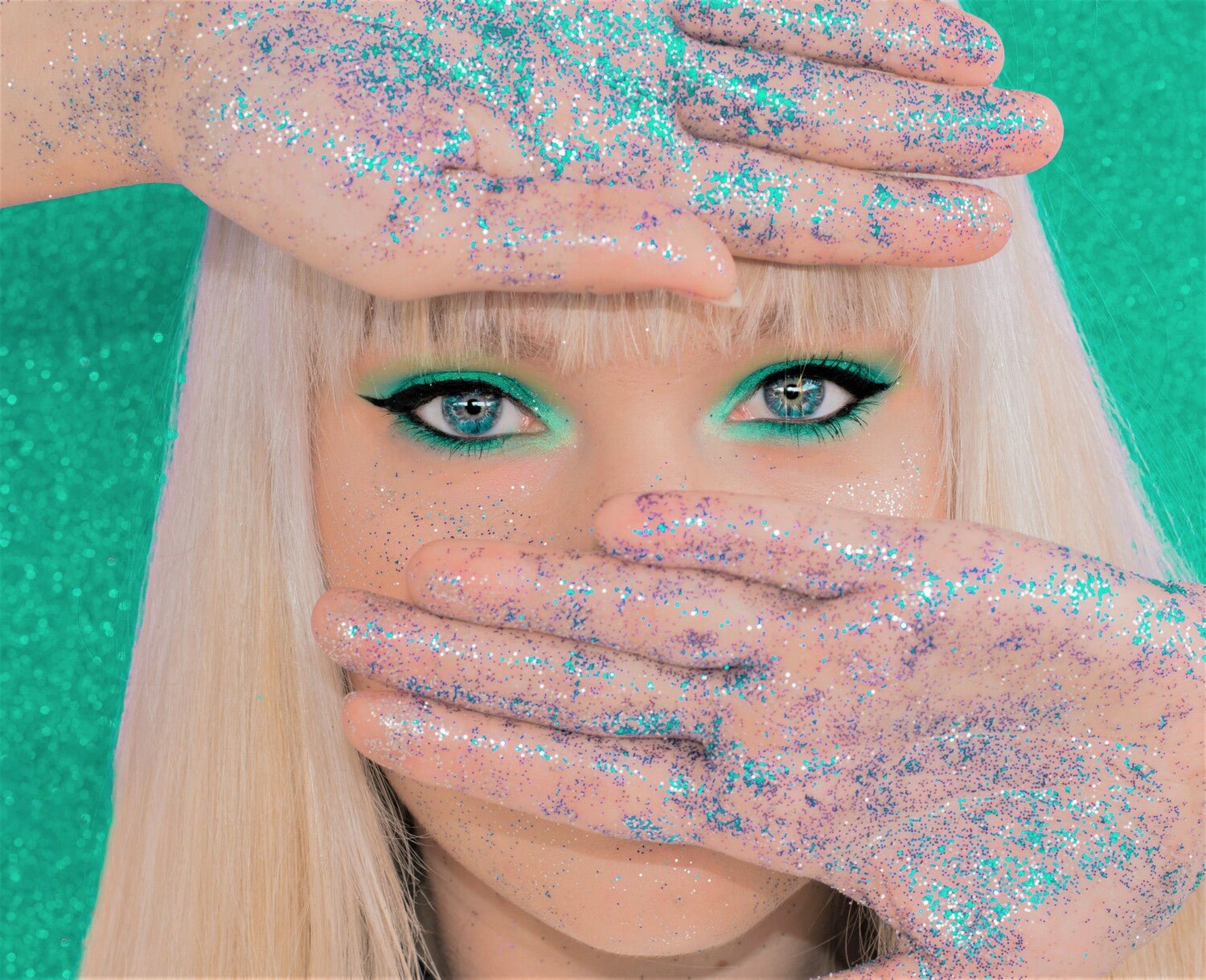 Close-up of biodegradable cosmetic glitter applied softly on cheekbones and eyelids with comfortable skin-friendly sparkle